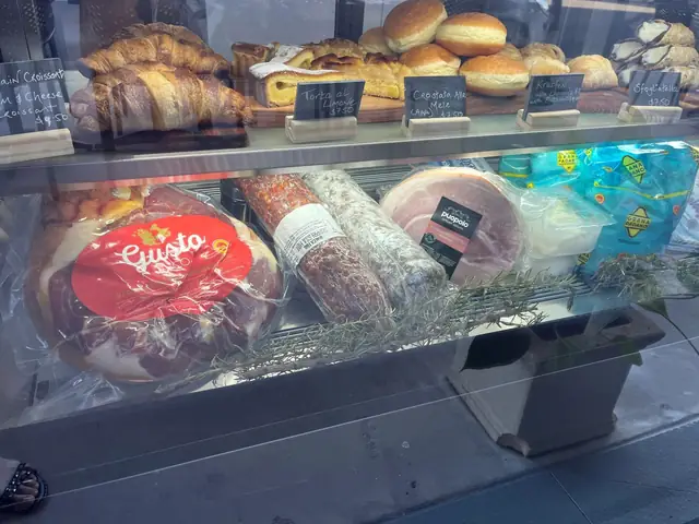 Deli counter with breads, pastries and cheeses
