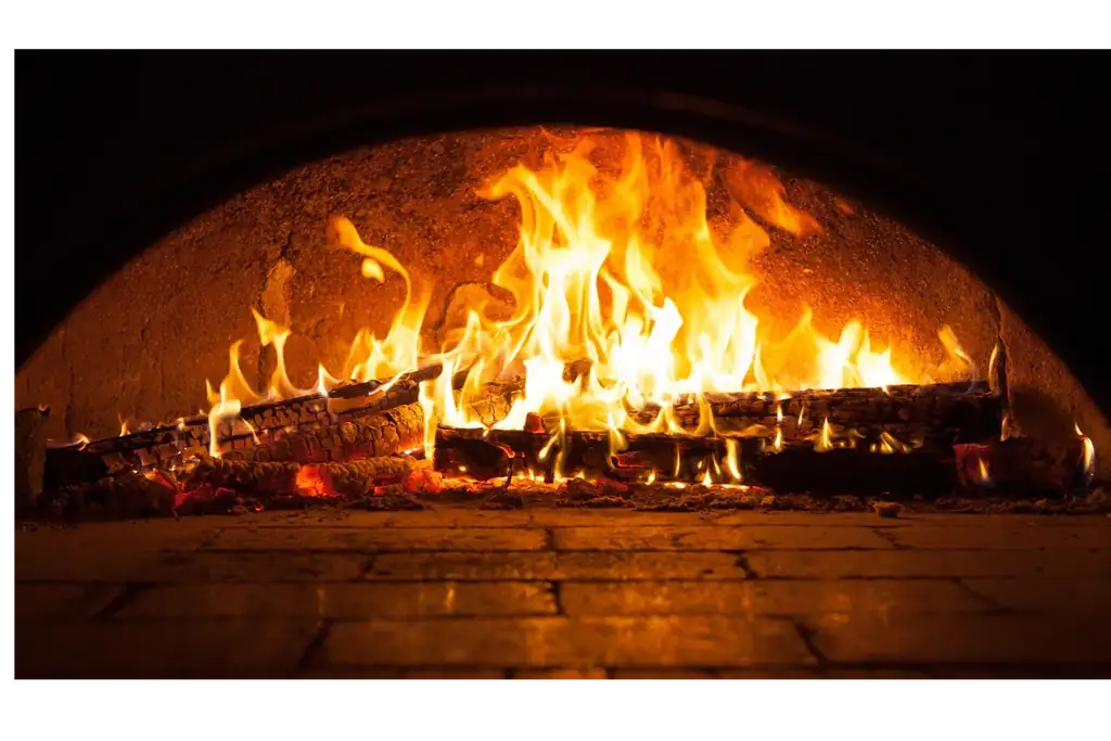Fire burning in the oven arch at Suriano’s